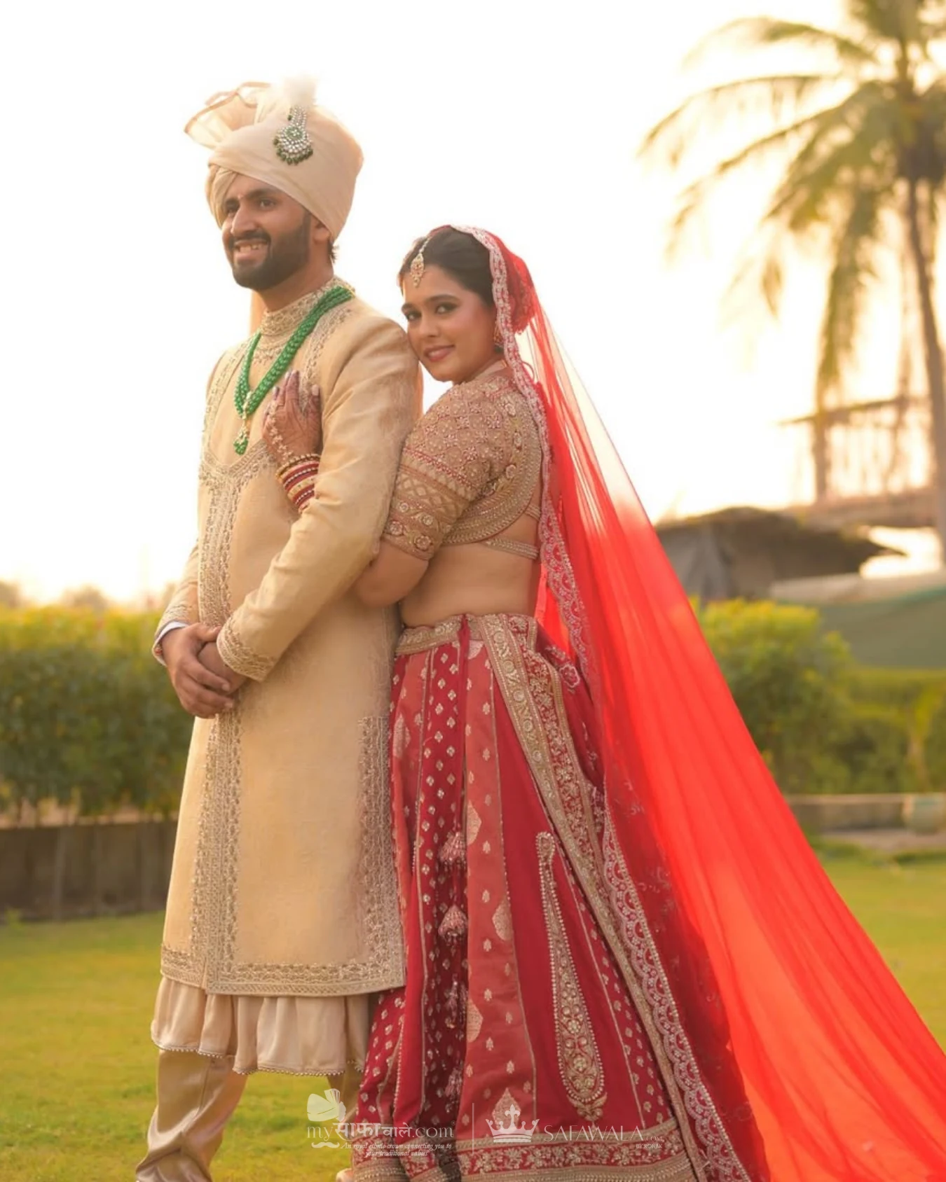 Classic groom pagdi styled with a red ceremonial stole for Bhilad
